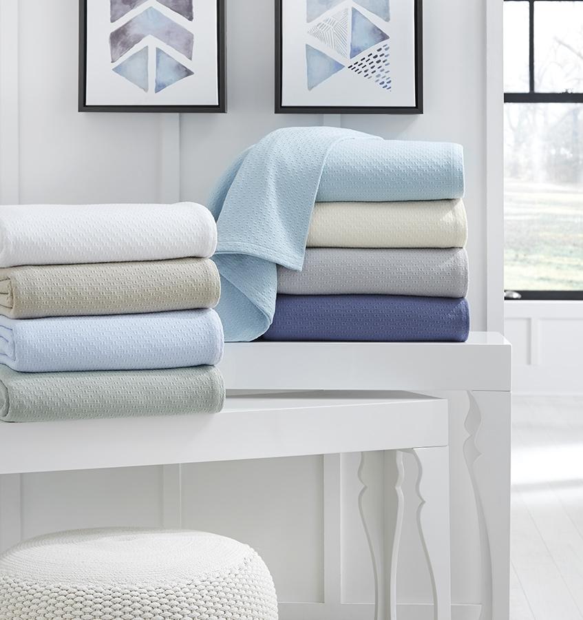 Corino Blanket 100% cotton, textural weave design, 1-inch turn hem, made in Portugal