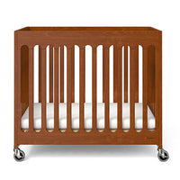 Compact Boutique™ Solid Wood Folding Crib, Multiple Finish Options