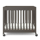 Compact Boutique™ Solid Wood Folding Crib, Multiple Finish Options