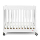 Compact Boutique™ Solid Wood Folding Crib, Multiple Finish Options